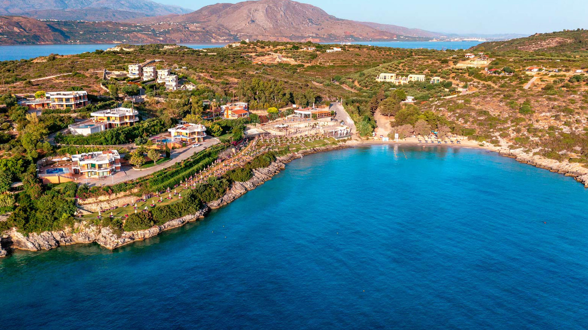 Loutraki Beach Chania Crete with calm blue waters and coastal landscape