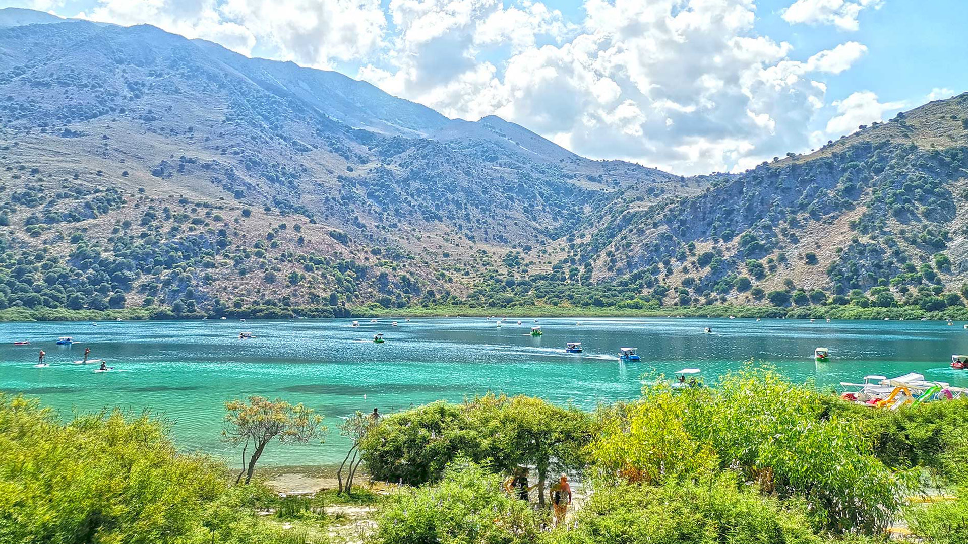 Lake Kournas in Crete with mountains and clear freshwater lake
